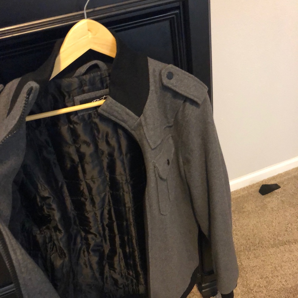 Gray winter jacket w/black collar trim never been worn.